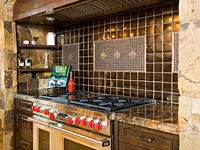 Stone and Granite kitchen With Metal Backsplash